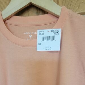 American Eagle Light Orange T-Shirt. New With Tags Size Medium.